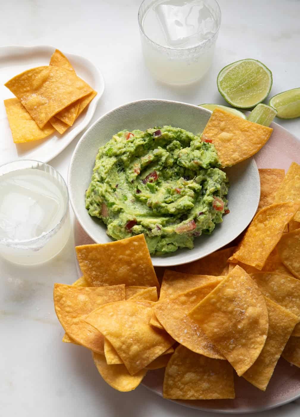 Homemade tortilla chips with guacamole. 